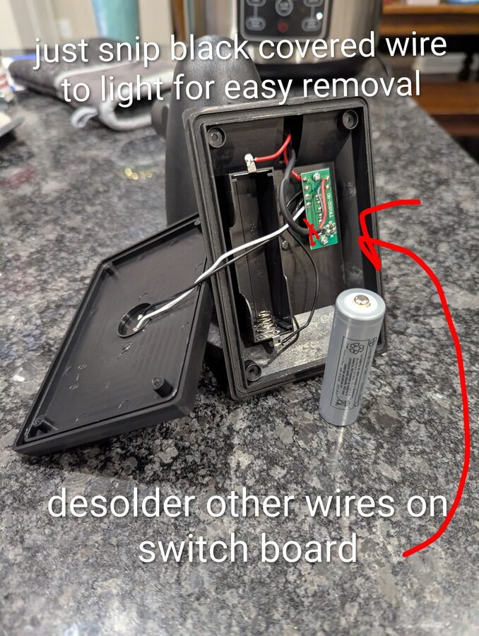 Opening the enclosure - snip the LED wire, desolder switch board wires
