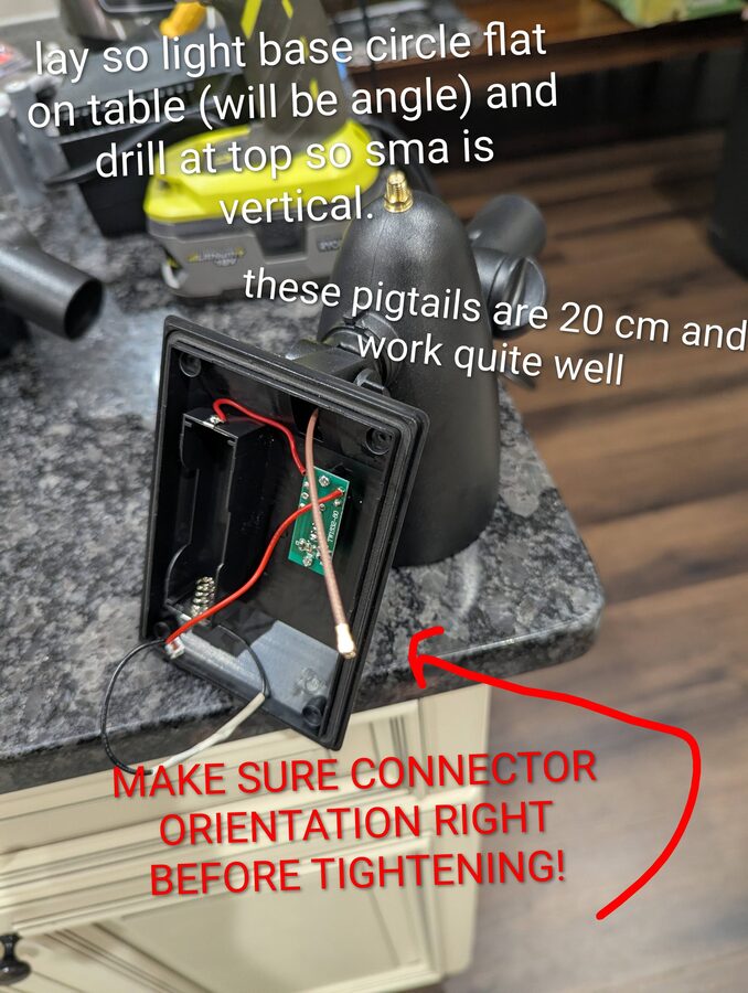 Drilling placement and SMA pigtail routing - lay flat, drill at top